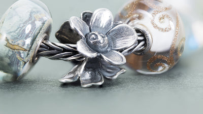 silver flower bead with glass beads